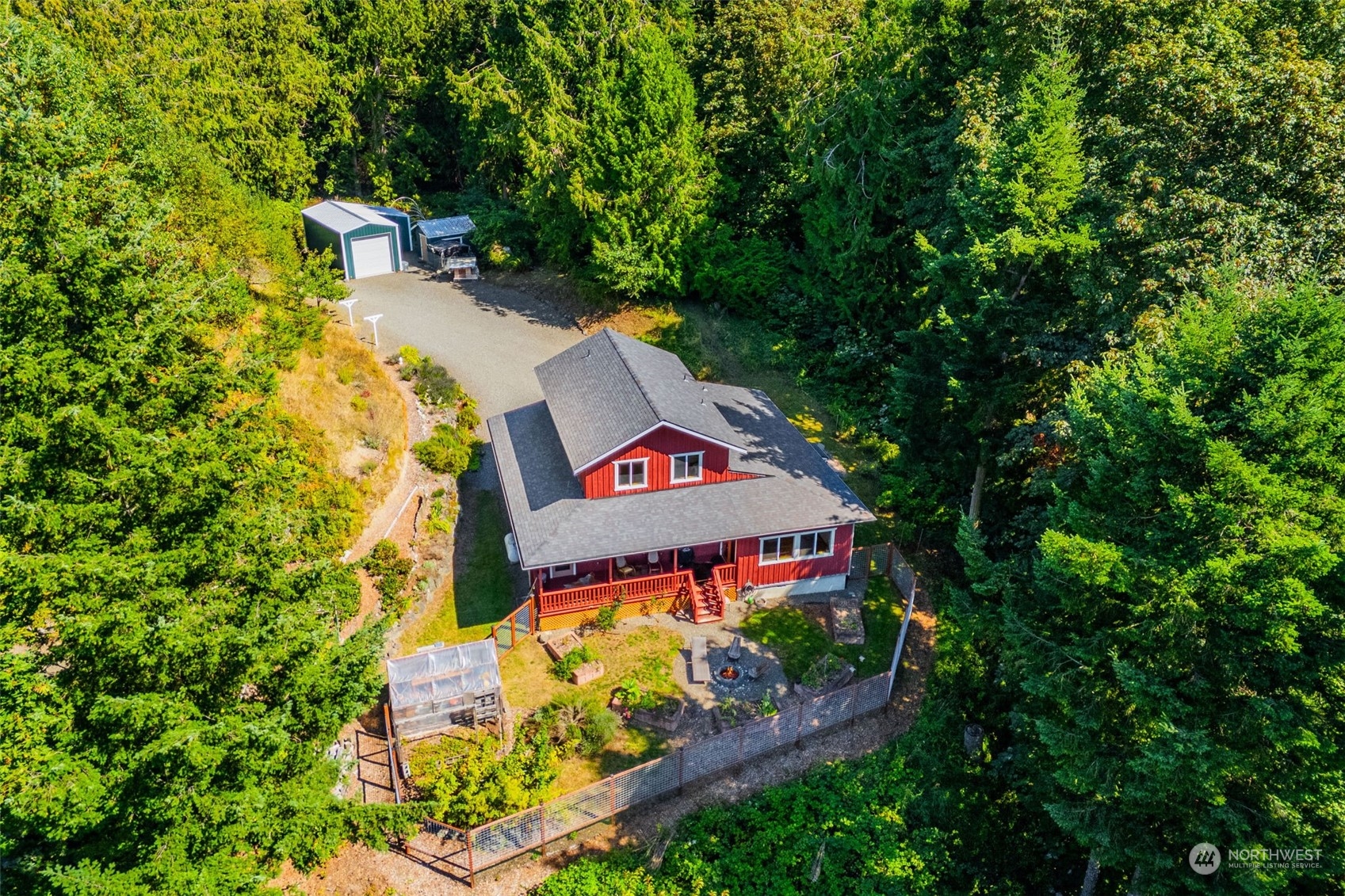 702 Sugar Hill Road Port Hadlock, WA 98339 - Photo 5 of 40 an aerial view of a house with outdoor space