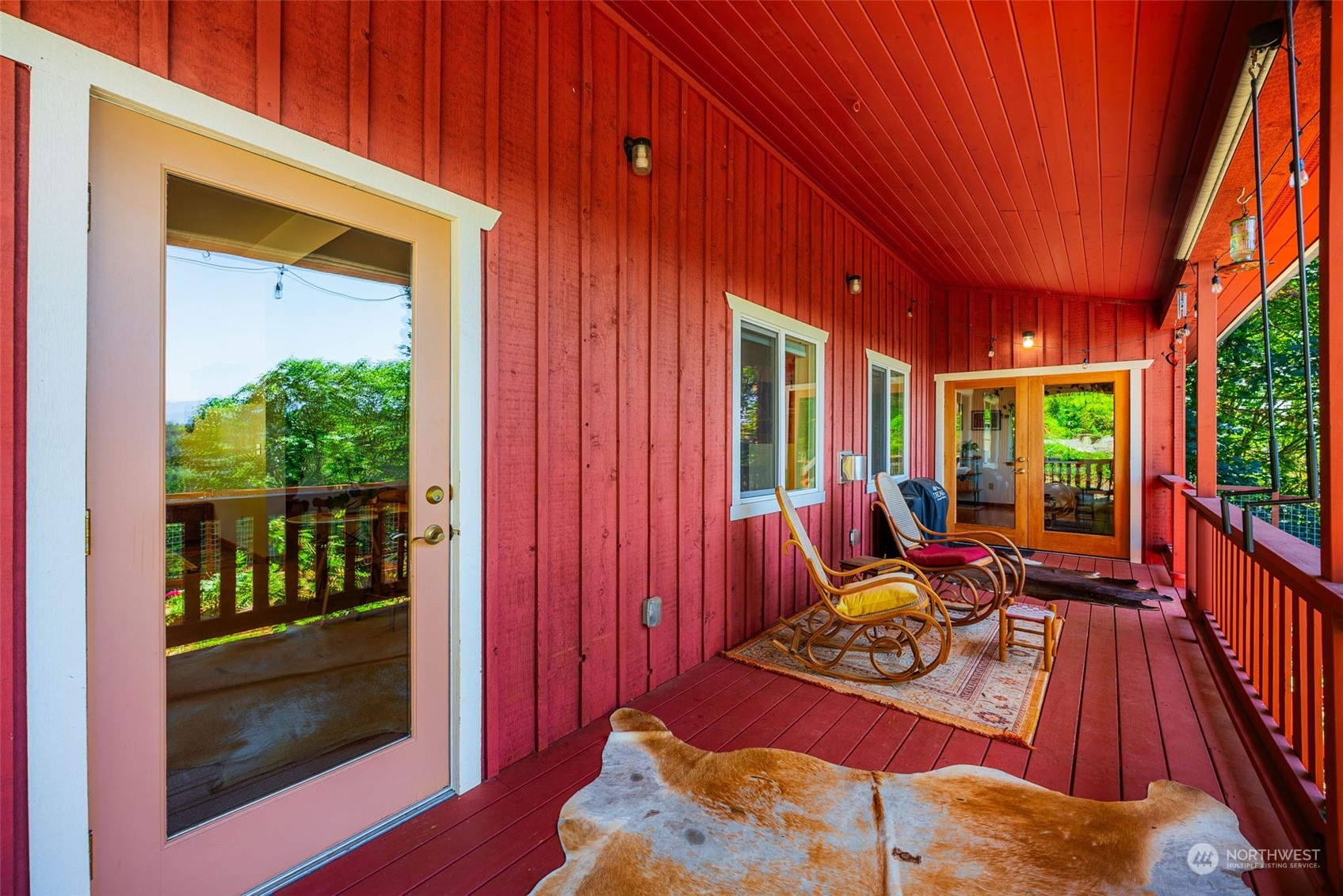 702 Sugar Hill Road Port Hadlock, WA 98339 - Photo 7 of 40 a view of a patio with table and chairs and potted plants