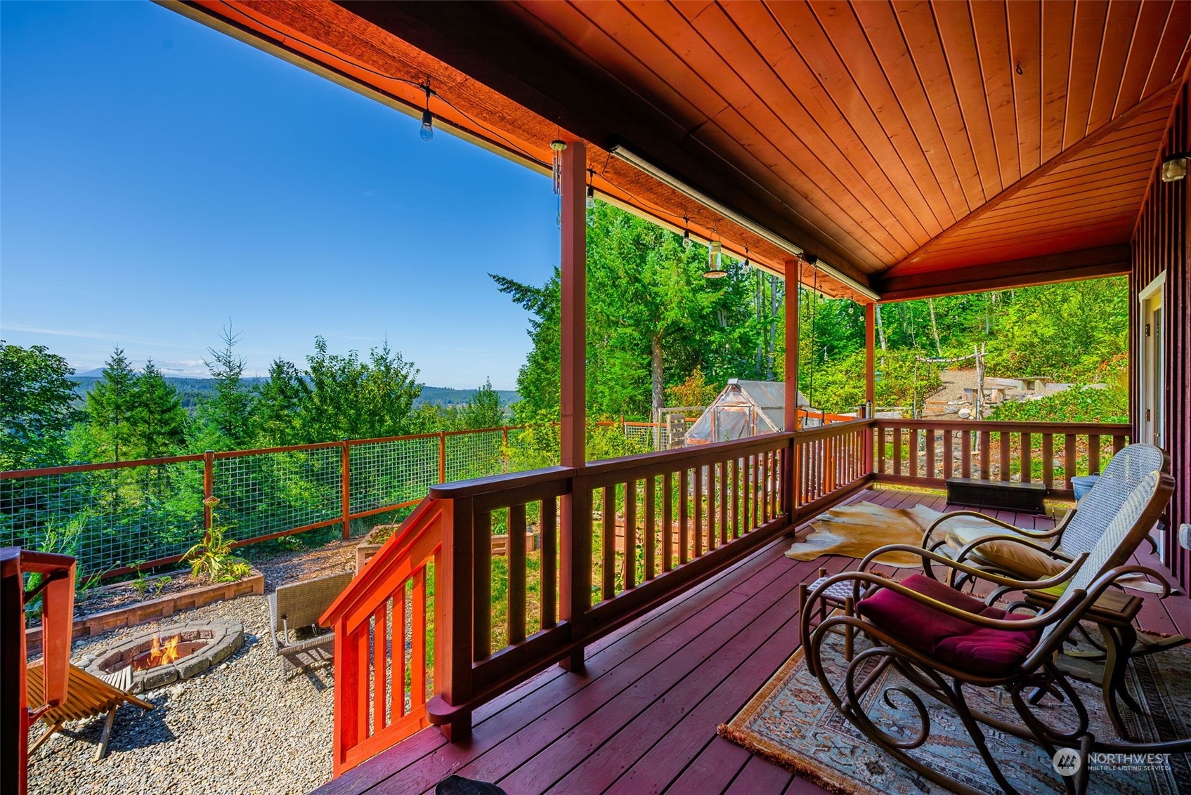 702 Sugar Hill Road Port Hadlock, WA 98339 - Photo 8 of 40 a view of a two chairs in the balcony