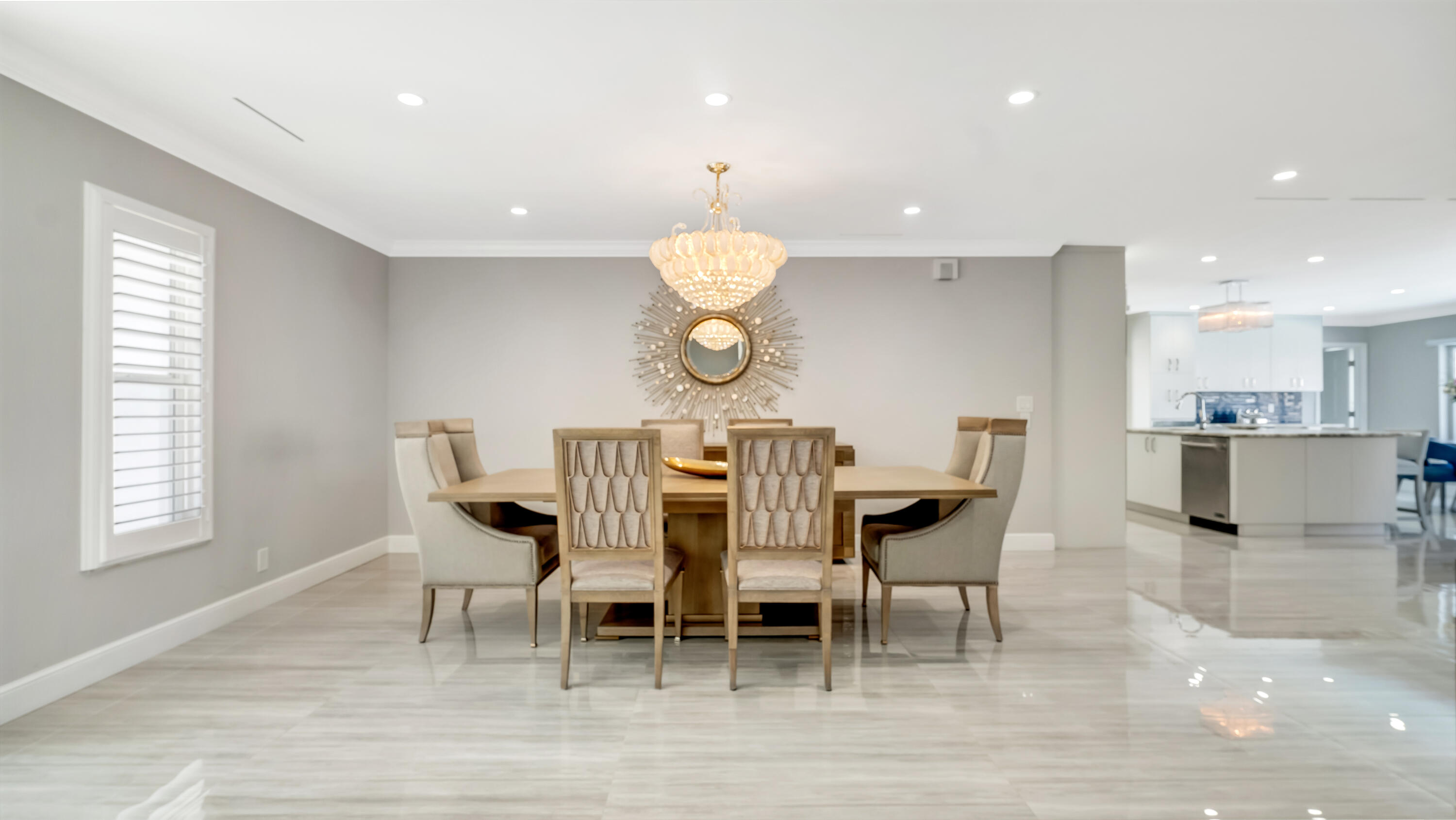 831 Dover Street Boca Raton, FL 33487 - Photo 17 of 71 a view of a dining room with furniture and wooden floor