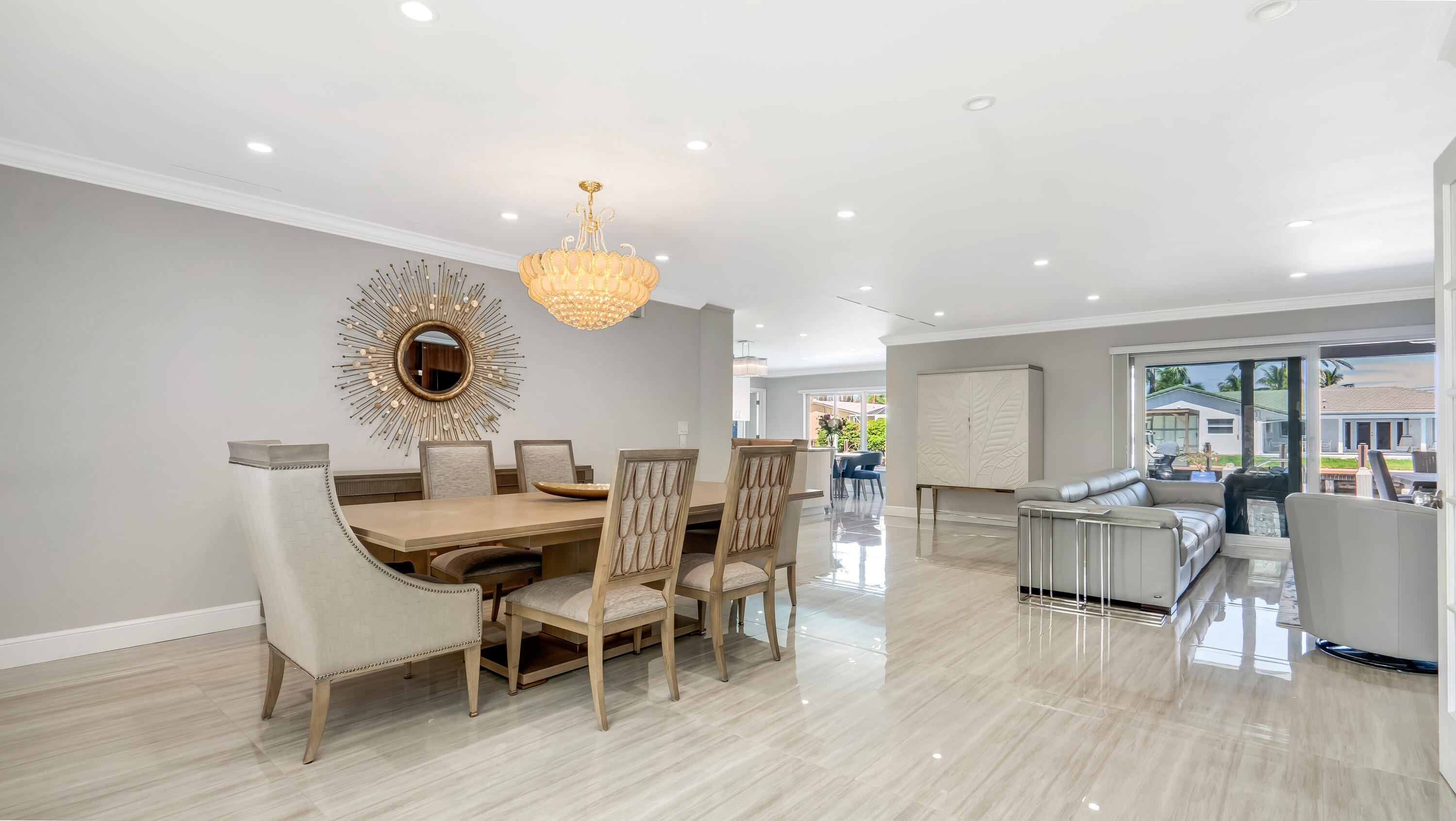831 Dover Street Boca Raton, FL 33487 - Photo 18 of 71 a view of a dining room with furniture and wooden floor
