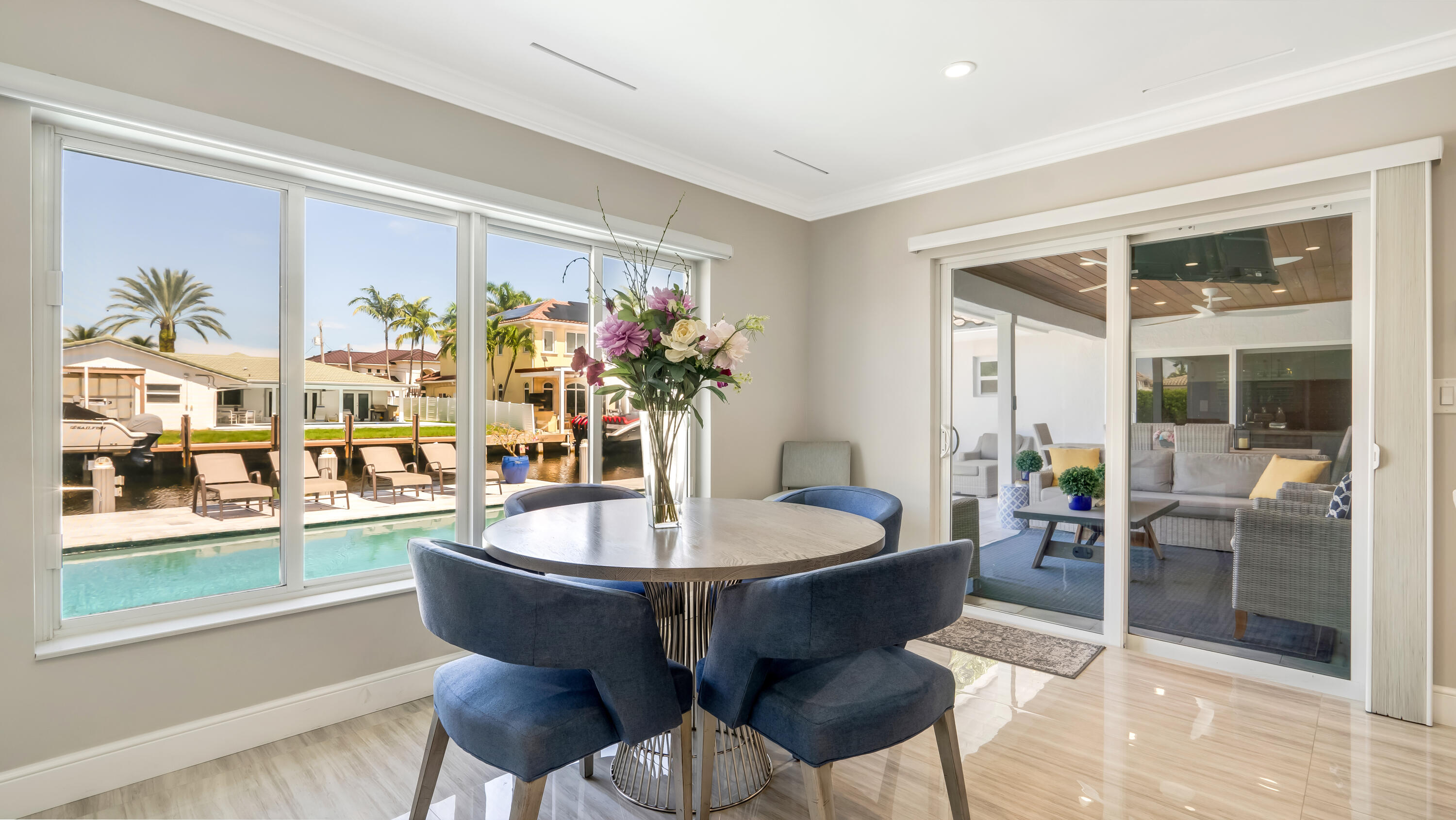831 Dover Street Boca Raton, FL 33487 - Photo 28 of 71 a view of a dining room with furniture window and outside view