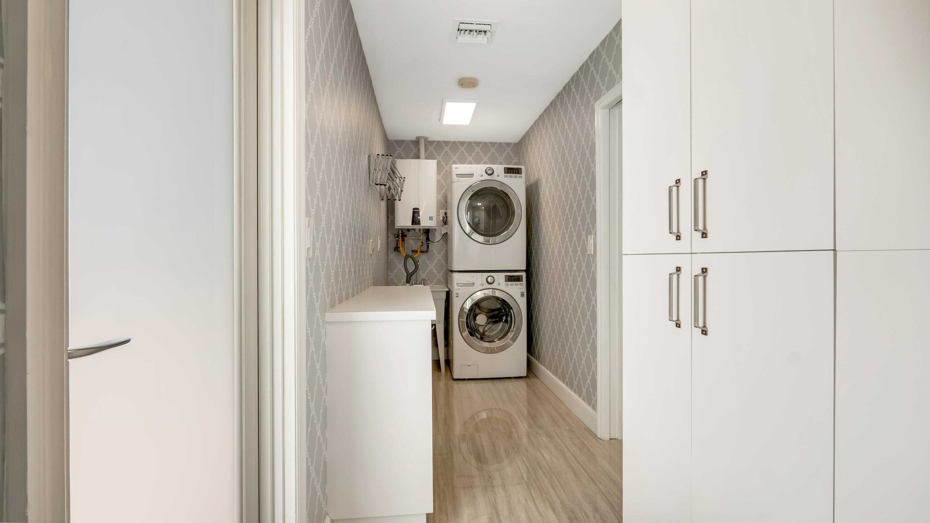 831 Dover Street Boca Raton, FL 33487 - Photo 34 of 71 a view of washer and dryer