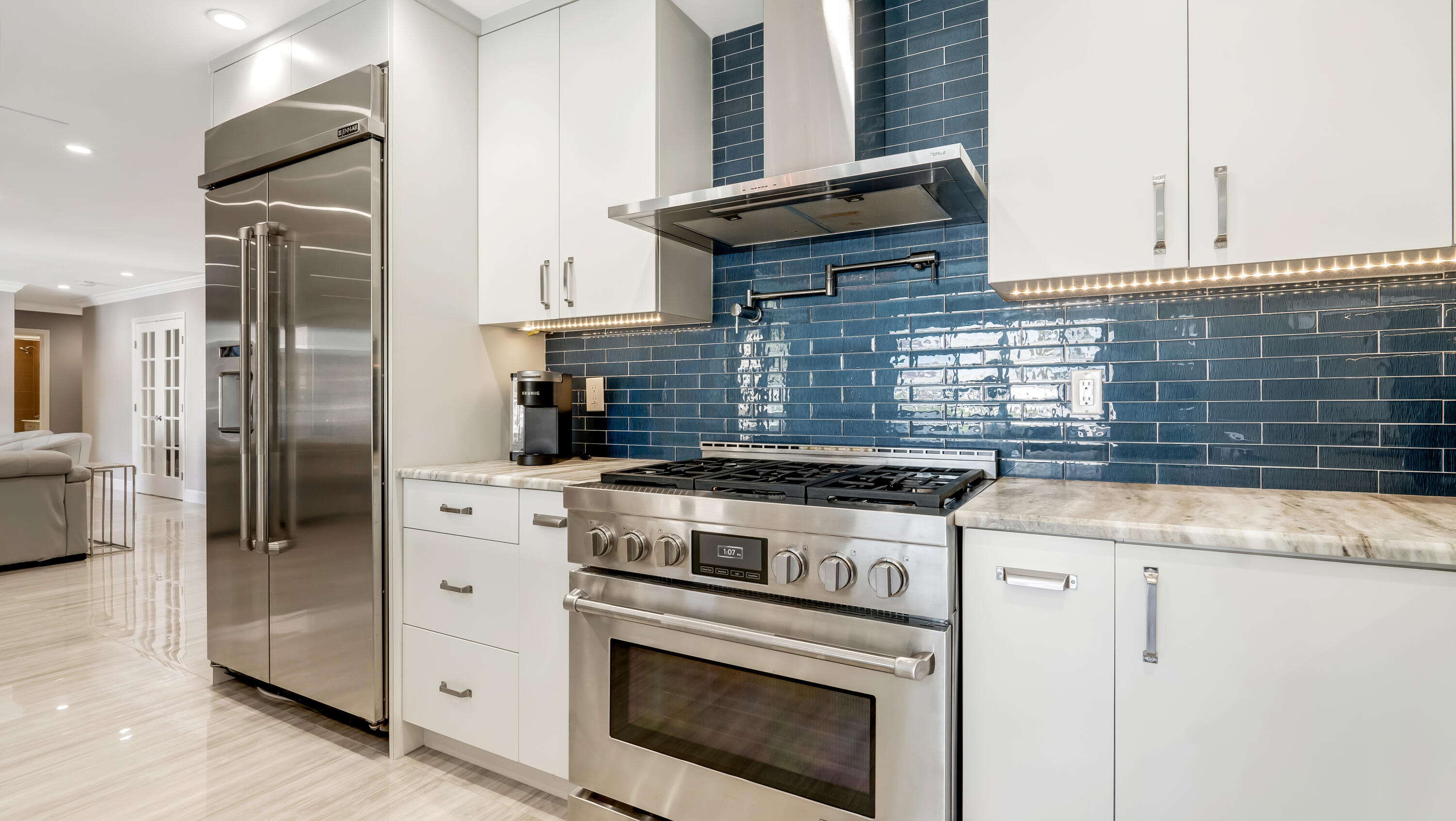 831 Dover Street Boca Raton, FL 33487 - Photo 36 of 71 a kitchen with stainless steel appliances granite countertop a stove a refrigerator and a cabinets
