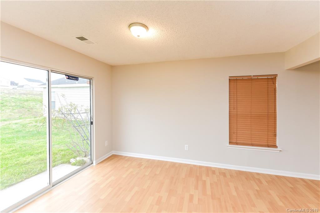 2031 Pimpernel Road Charlotte, NC 28213 - Photo 13 of 25 a view of an empty room with a window