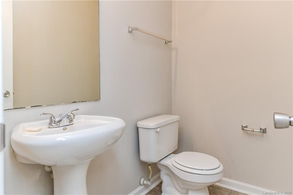 2031 Pimpernel Road Charlotte, NC 28213 - Photo 15 of 25 a bathroom with a sink and a toilet