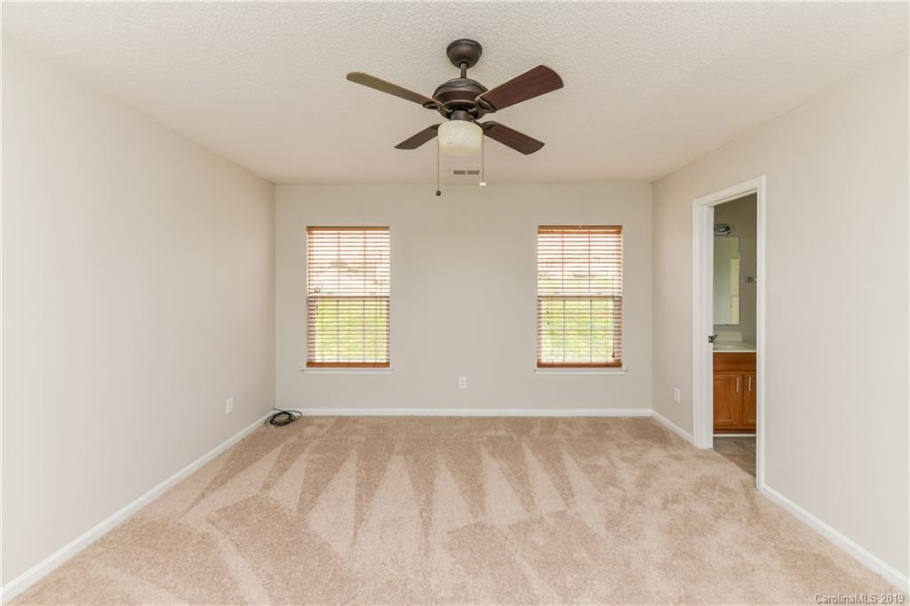 2031 Pimpernel Road Charlotte, NC 28213 - Photo 17 of 25 a view of an empty room with a window