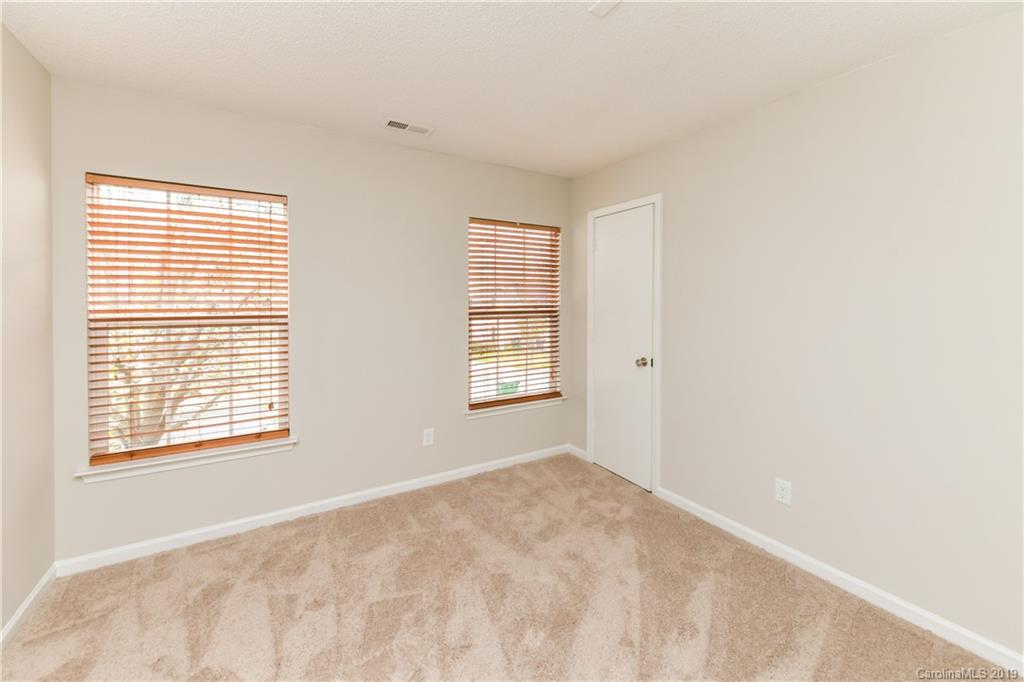 2031 Pimpernel Road Charlotte, NC 28213 - Photo 22 of 25 a view of an empty room with a window