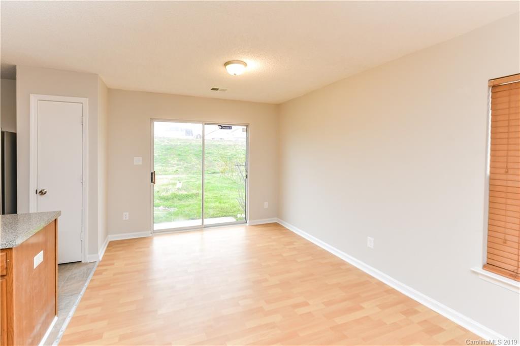 2031 Pimpernel Road Charlotte, NC 28213 - Photo 6 of 25 a view of an empty room with a window