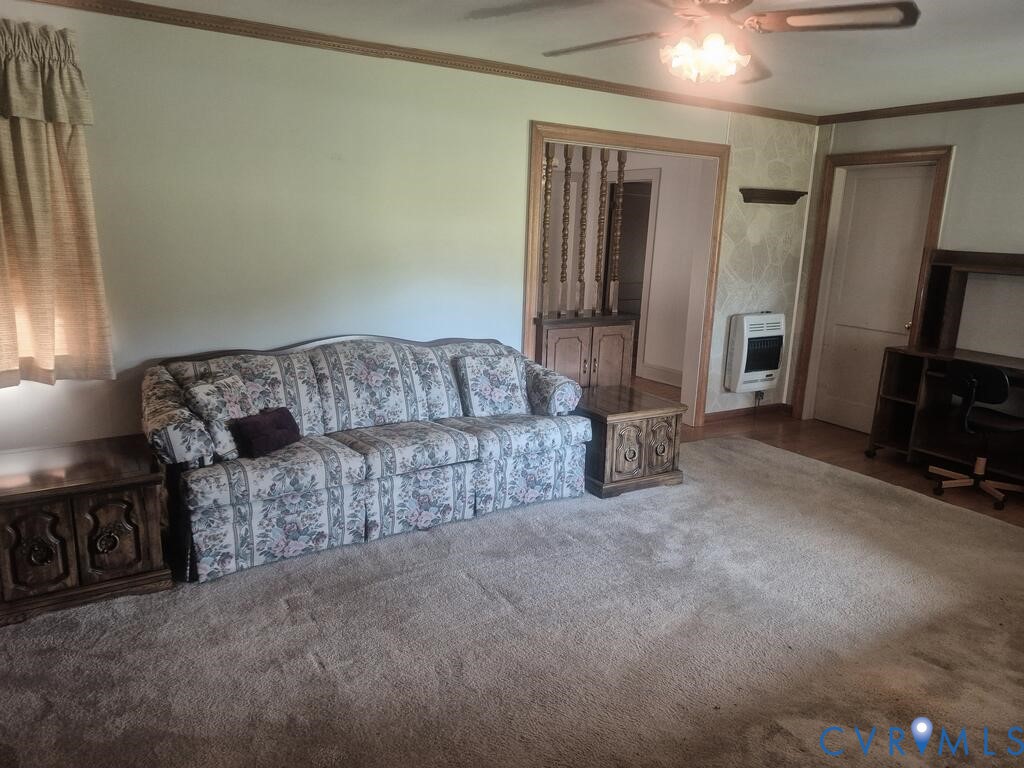 519 Buffalo Heights Road Farmville, VA 23901 - Photo 6 of 38 Carpeted living area with crown molding, a ceiling