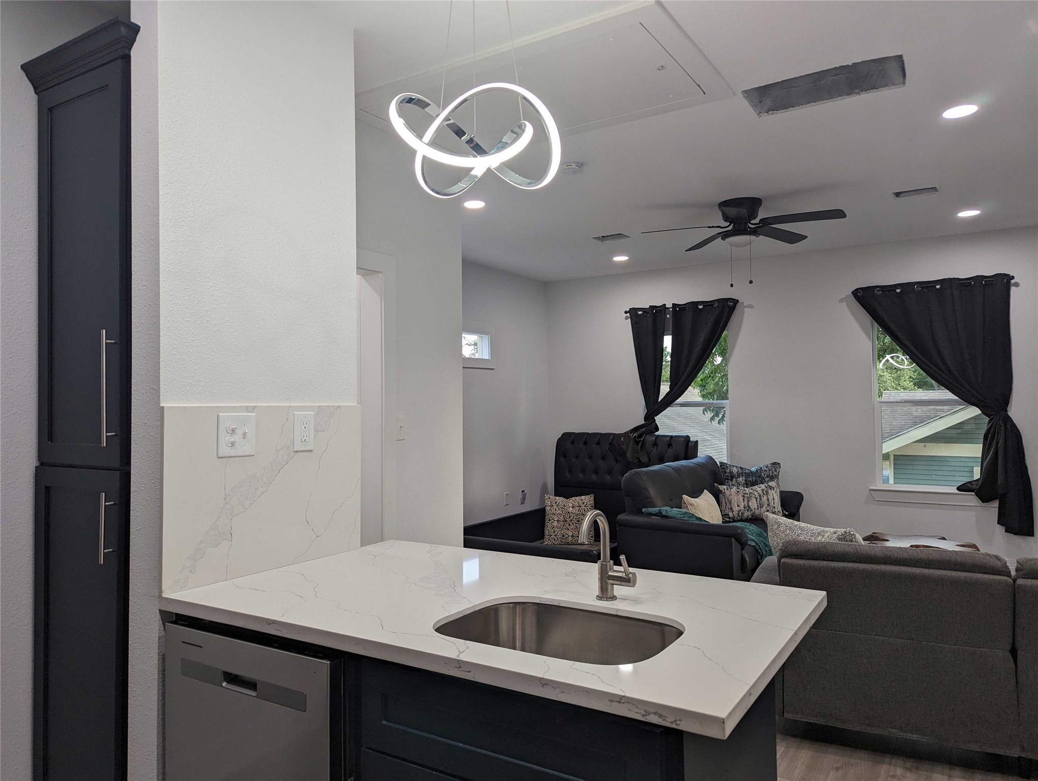4711 Rusk Street, Unit A Houston, TX 77023 - Photo 8 of 19 a bathroom with a sink and a mirror
