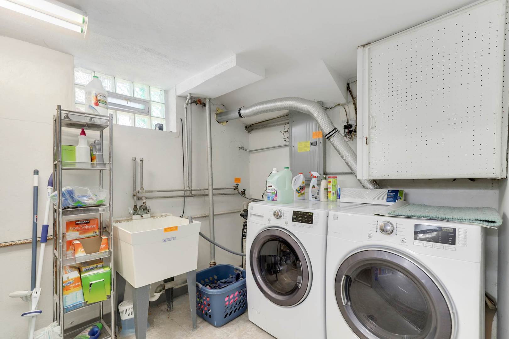 3906 Wolf Road Western Springs, IL 60558 - Photo 27 of 33 a utility room with dryer washer and a view of living room