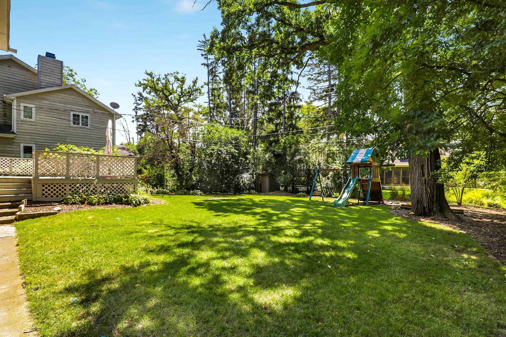 3906 Wolf Road Western Springs, IL 60558 - Photo 30 of 33 a view of a backyard with large trees