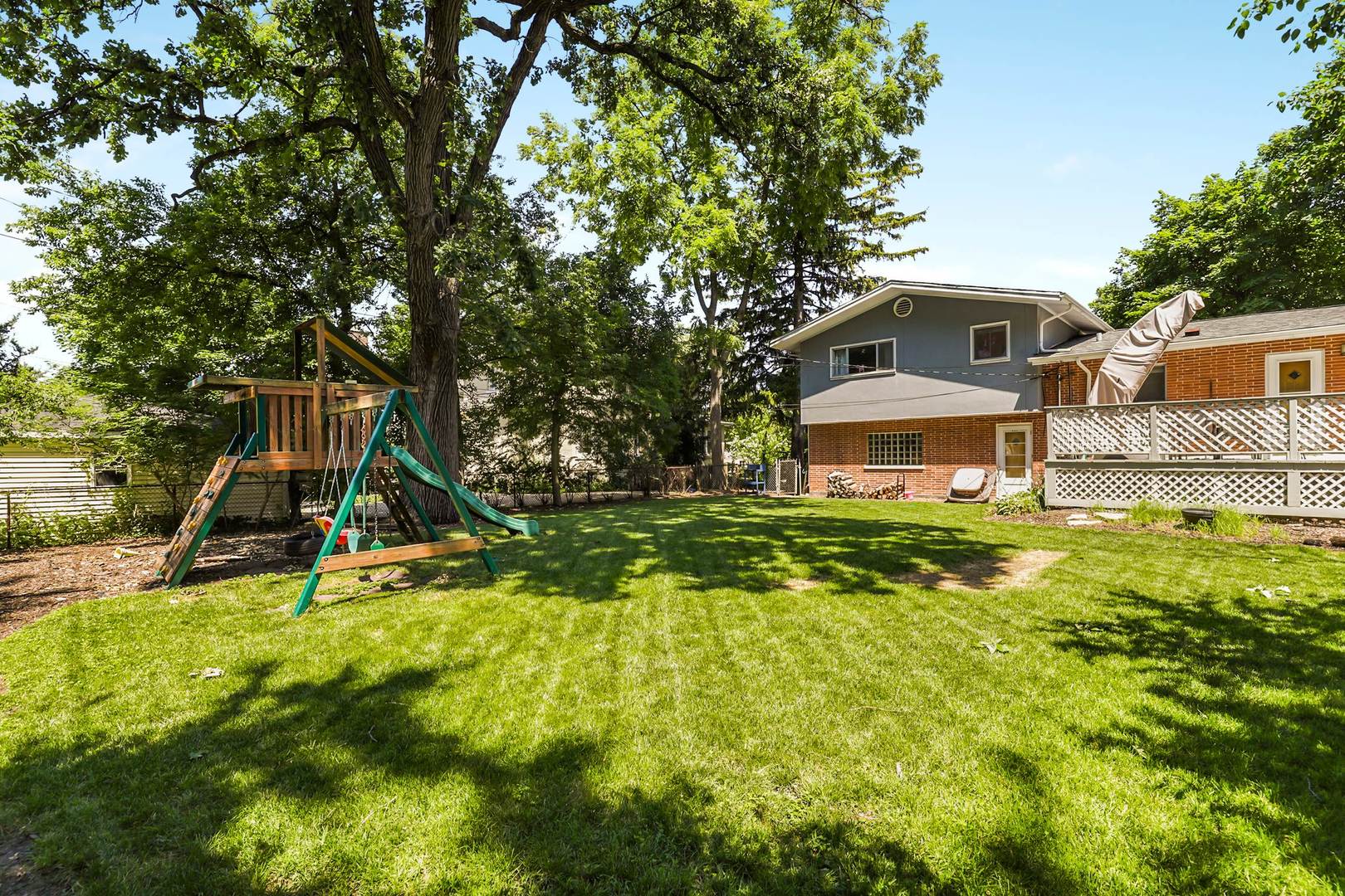 3906 Wolf Road Western Springs, IL 60558 - Photo 32 of 33 a view of a house with a big yard and large trees