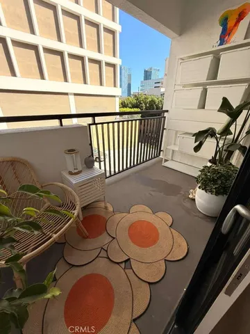 a room with furniture and a toilet