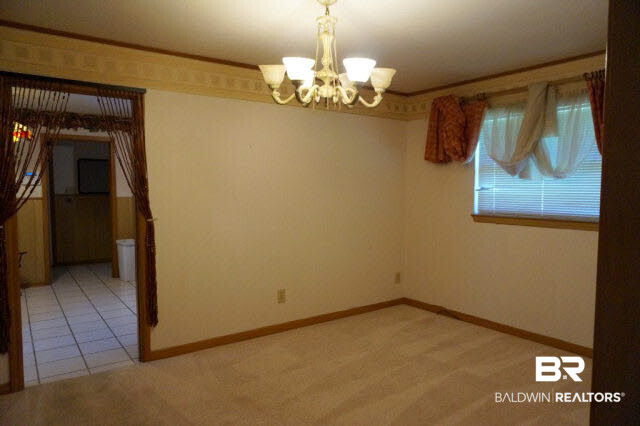 107 Spanish Main Spanish Fort, AL 36527 - Photo 2 of 13 Formal dining room is off foyer