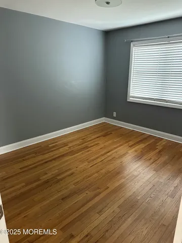 a bathroom with a tub and a shower