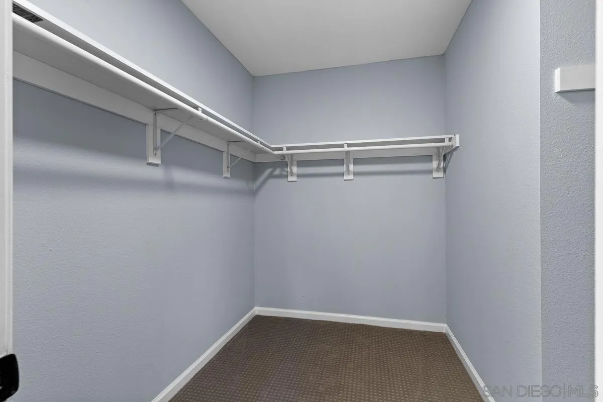 13948 Carmel Ridge Road San Diego, CA 92128 - Photo 20 of 26 a view of walk in closet