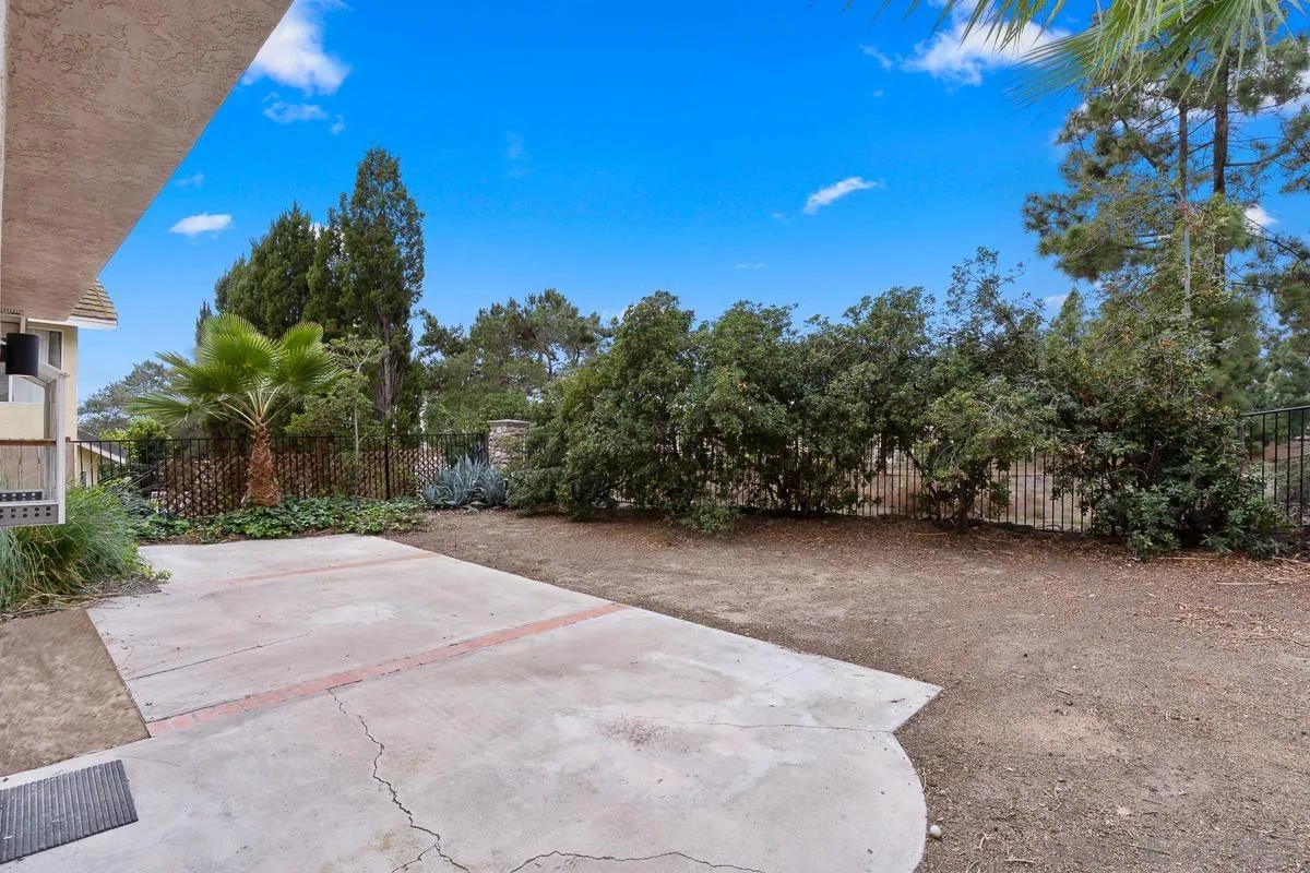 13948 Carmel Ridge Road San Diego, CA 92128 - Photo 25 of 26 a view of a house with a yard