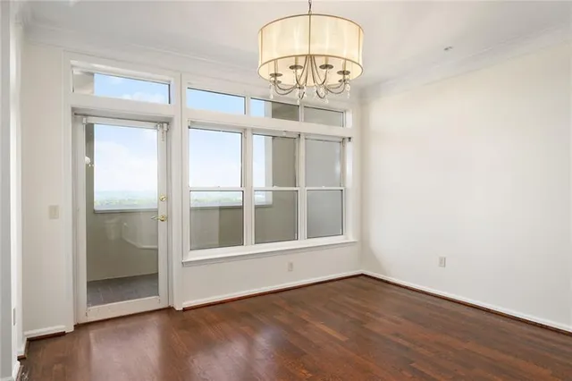 a view of a room next to a yard