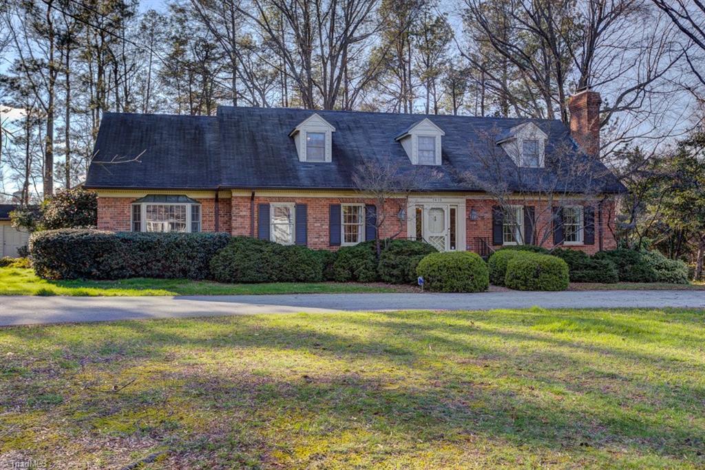 1415 Heathcliff Road High Point, NC 27262 - Photo 1 of 29 Custom built, all brick Emerywood Forest home with Guest Quarters and a circular driveway.