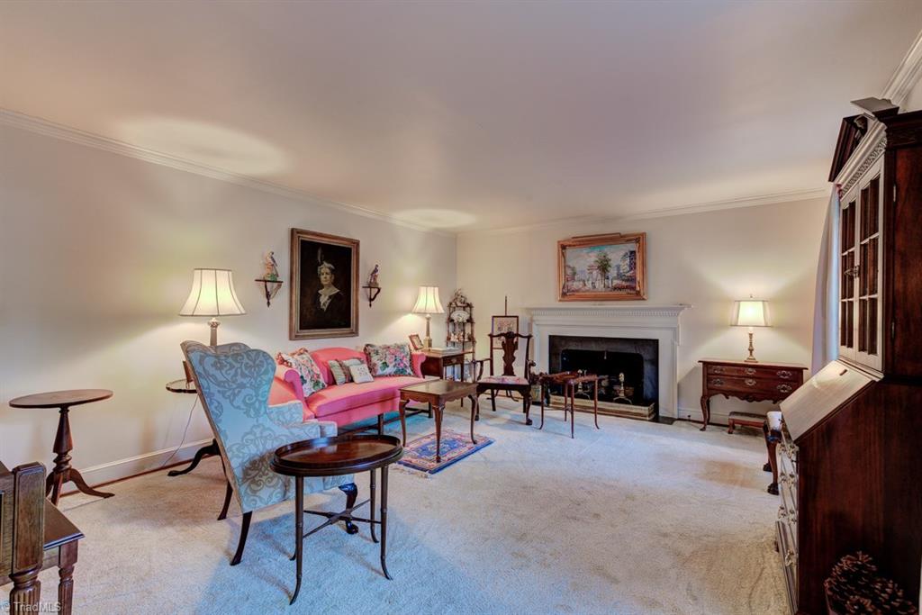 1415 Heathcliff Road High Point, NC 27262 - Photo 3 of 29 The first of three fireplaces is in this very spacious living room.