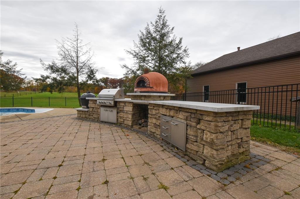 390 Dodds Road Butler, PA 16002 - Photo 23 of 36 a view of a backyard with sitting area