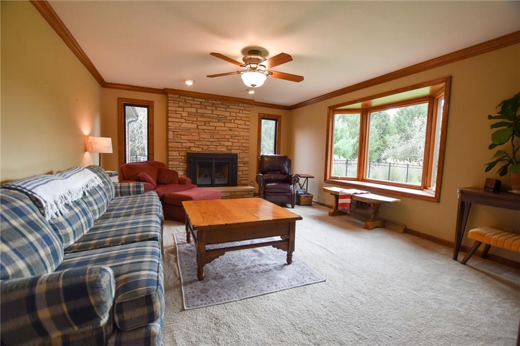 390 Dodds Road Butler, PA 16002 - Photo 8 of 36 a living room with furniture and a fireplace