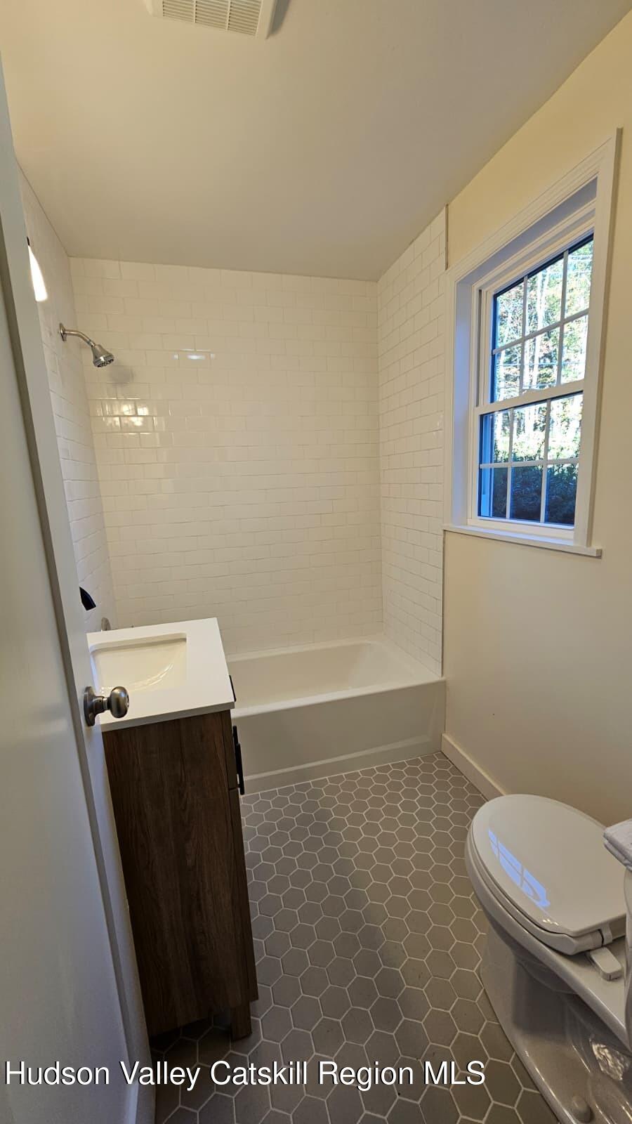 10370 Highway 22 Hillsdale, NY 12529 - Photo 7 of 7 a bathroom with a toilet and a shower