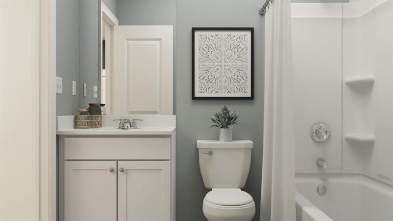 59 Constitution Avenue Pendergrass, GA 30567 - Photo 11 of 27 a bathroom with a sink a toilet and shower