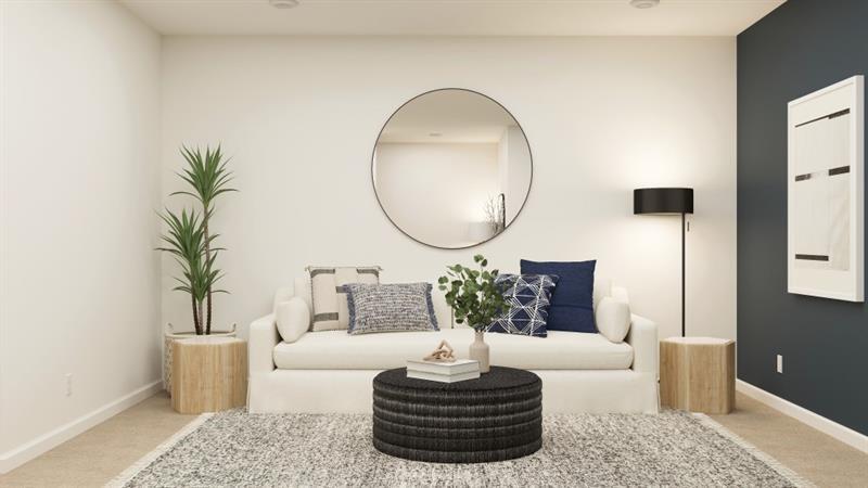 59 Constitution Avenue Pendergrass, GA 30567 - Photo 17 of 27 a living room with furniture and a potted plant