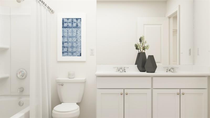 59 Constitution Avenue Pendergrass, GA 30567 - Photo 19 of 27 a bathroom with a sink a toilet and shower