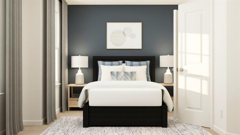 59 Constitution Avenue Pendergrass, GA 30567 - Photo 20 of 27 a bed sitting in a bedroom next to a window