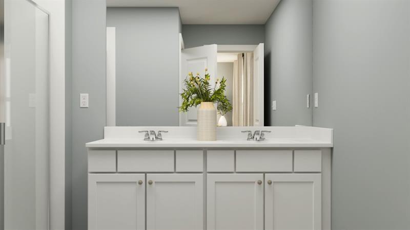 59 Constitution Avenue Pendergrass, GA 30567 - Photo 24 of 27 a bathroom with a sink and a mirror