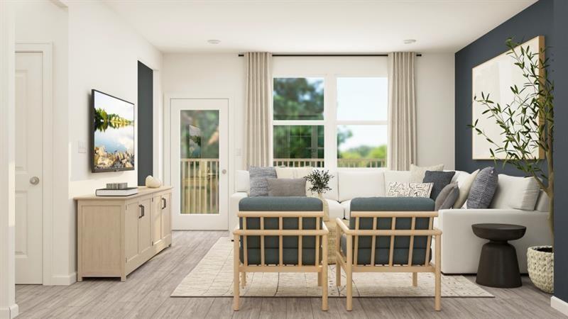 59 Constitution Avenue Pendergrass, GA 30567 - Photo 4 of 27 a living room with furniture and windows