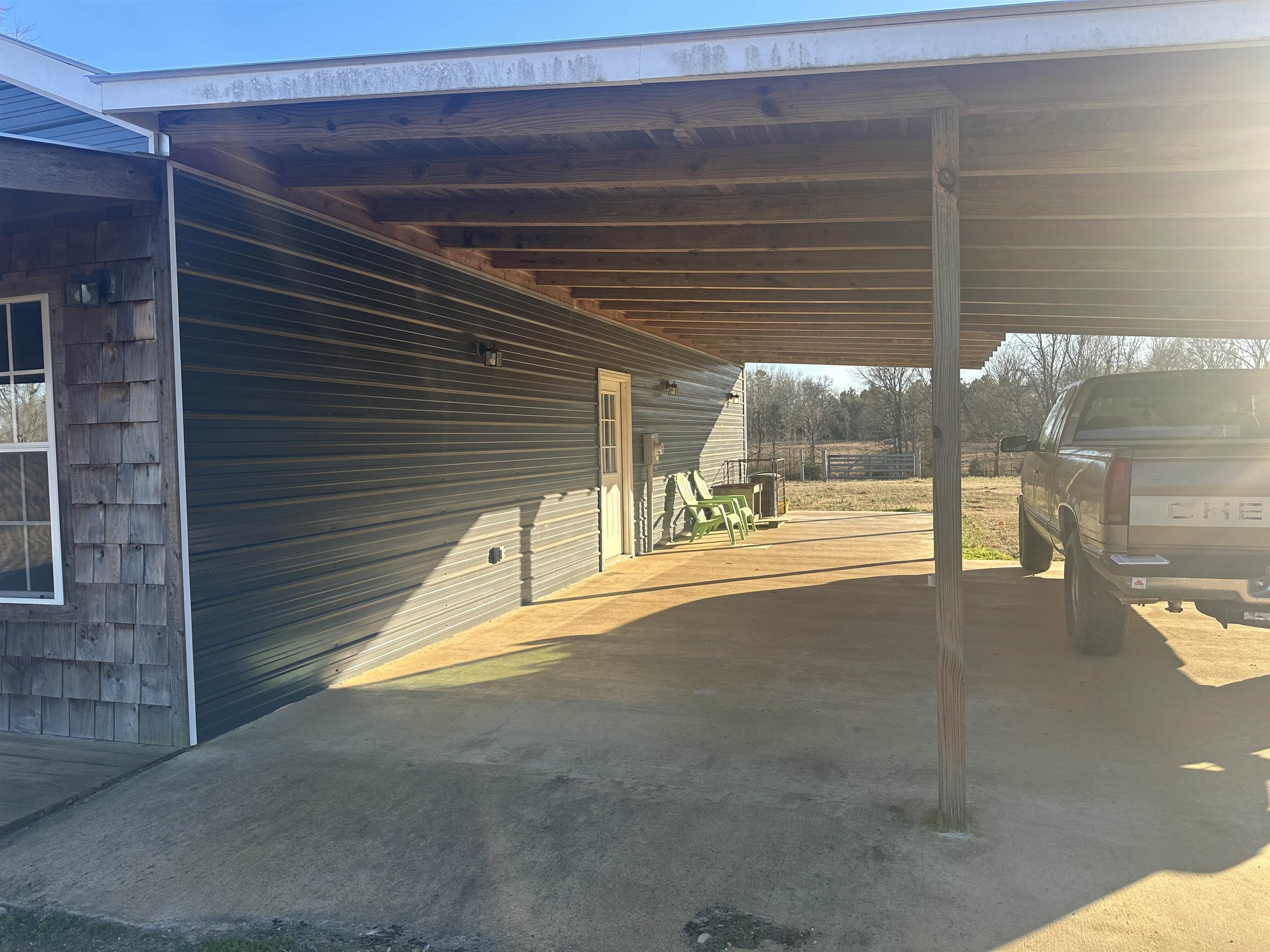 2245 Fritton Spur Road Middleton, TN 38052 - Photo 11 of 24 View of parking with an attached carport