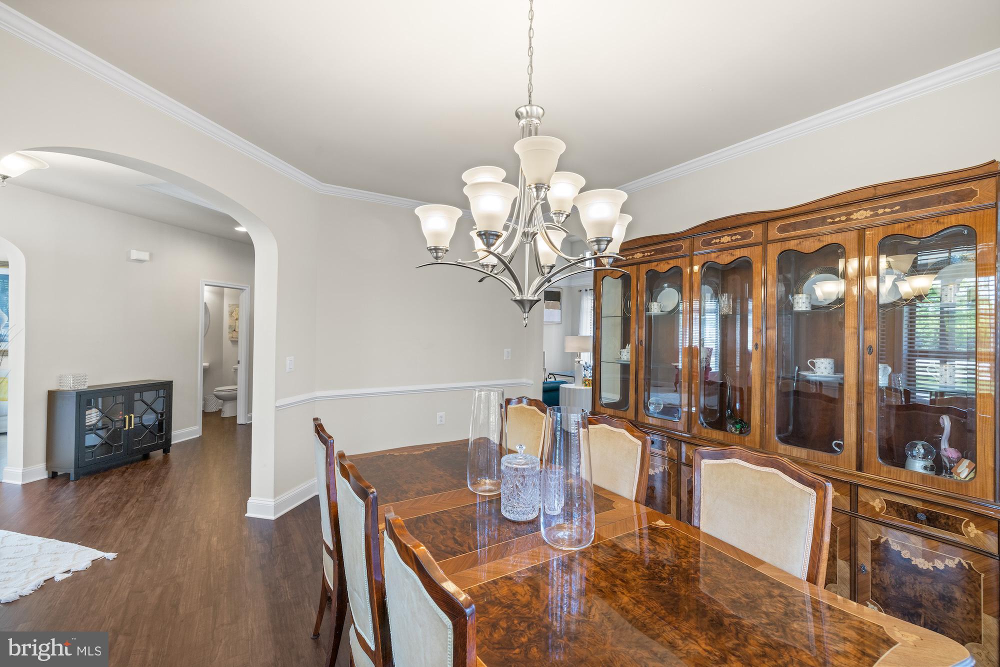 9 Lookout Court Gettysburg, PA 17325 - Photo 18 of 86 a view of a dining room with furniture a chandelier and wooden floor