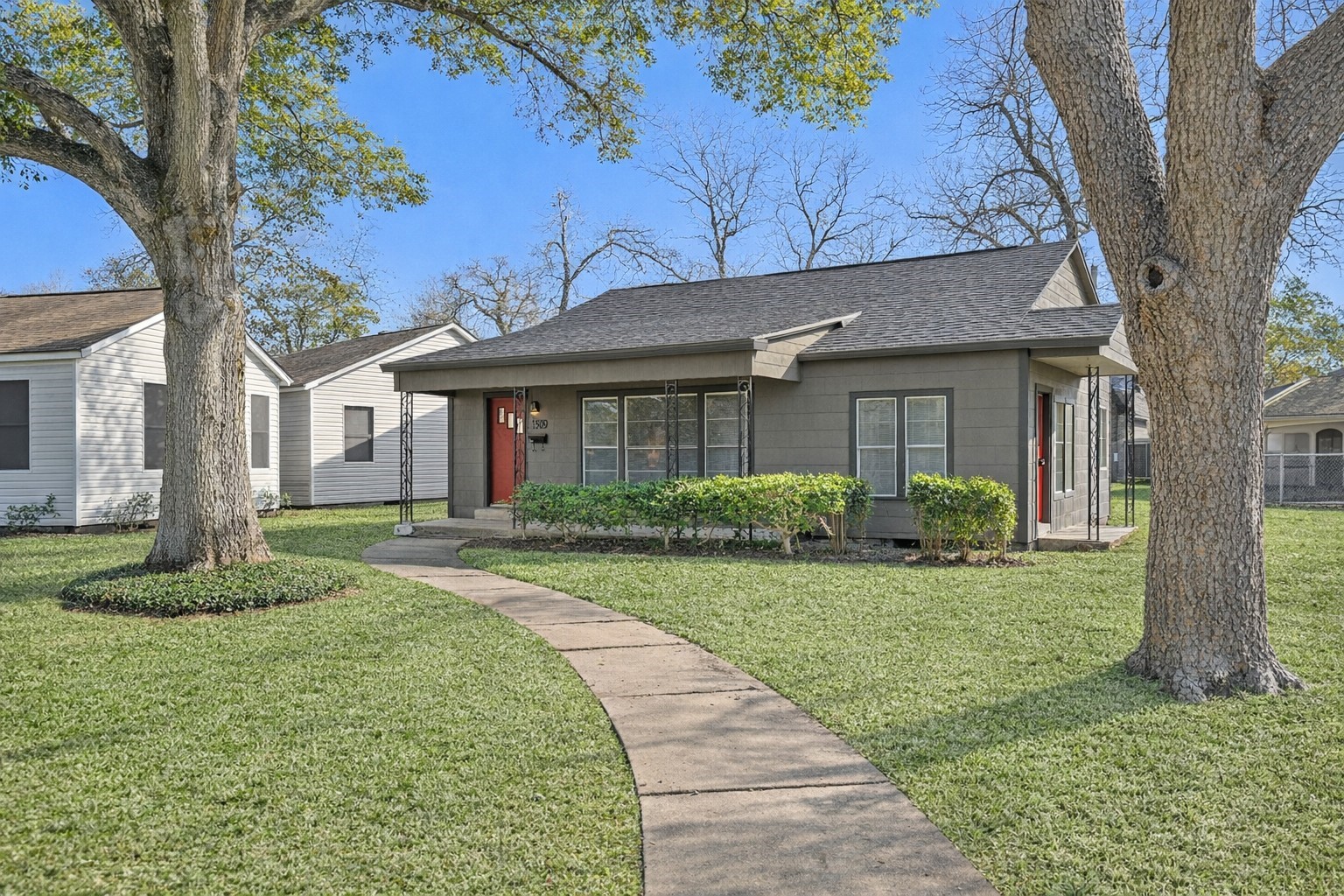 1509 Mulcahy Street Rosenberg, TX 77471 - Photo 40 of 41 a front view of a house with a yard