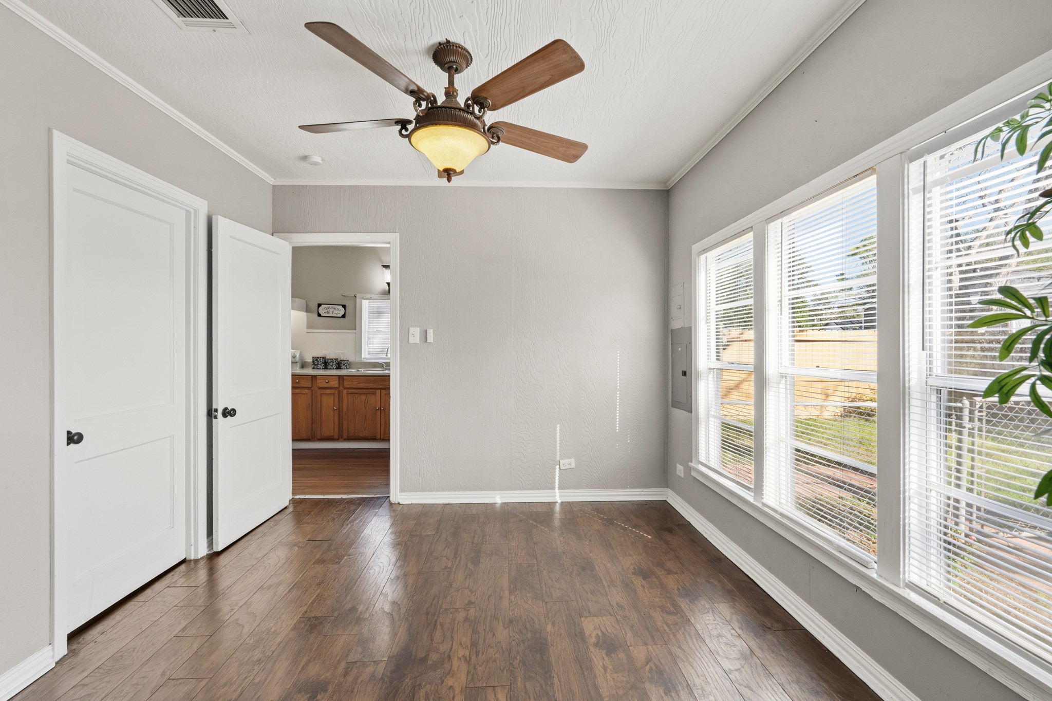 1509 Mulcahy Street Rosenberg, TX 77471 - Photo 16 of 41 a view of a livingroom with a ceiling fan and window