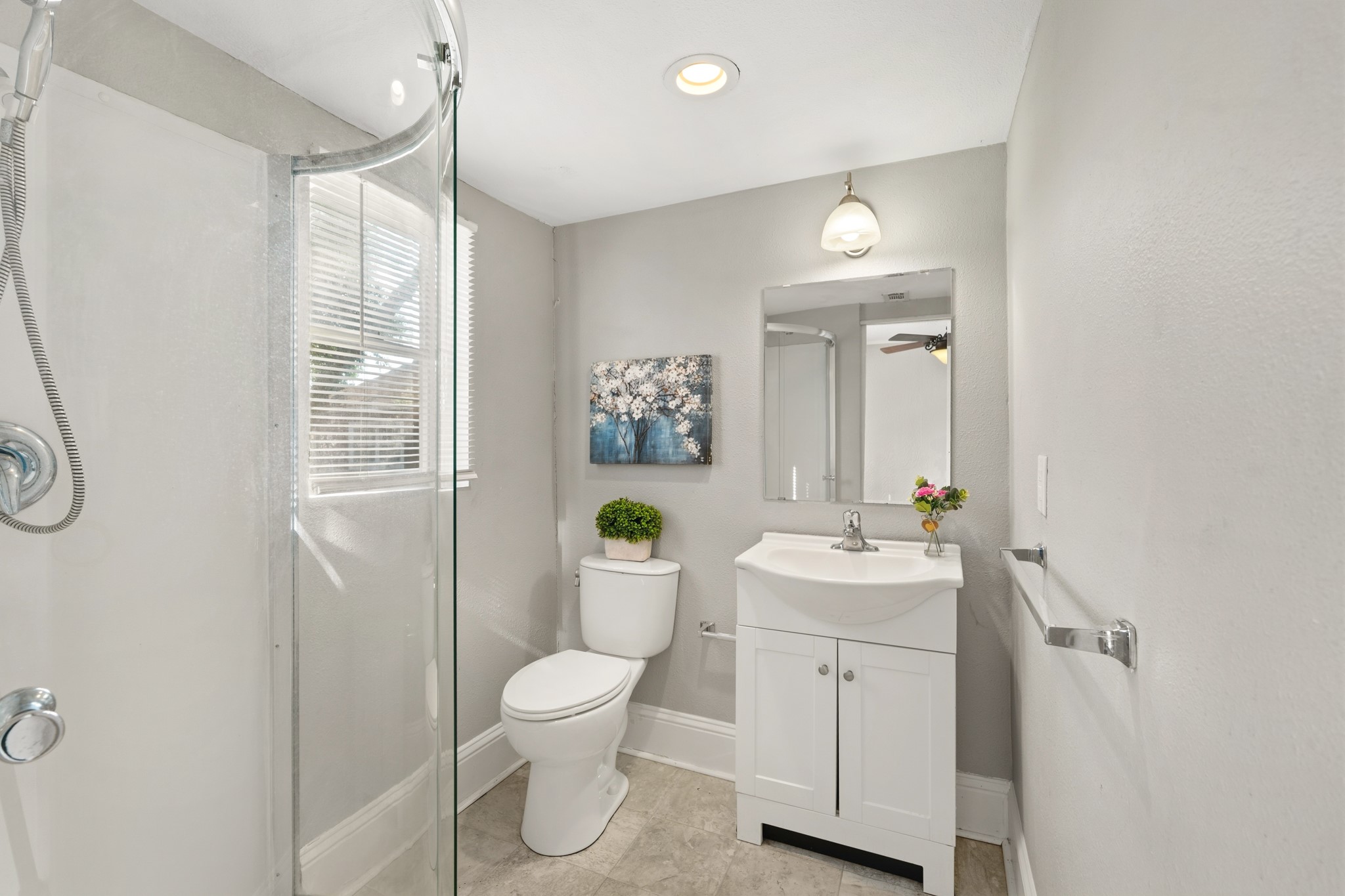 1509 Mulcahy Street Rosenberg, TX 77471 - Photo 17 of 41 a bathroom with a sink toilet and shower
