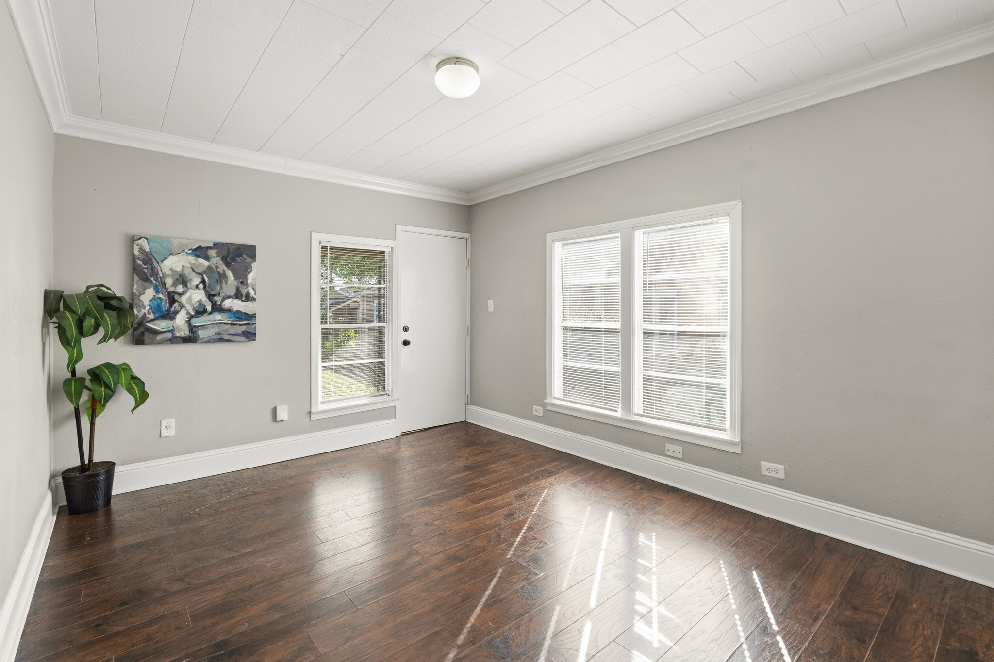 1509 Mulcahy Street Rosenberg, TX 77471 - Photo 19 of 41 a view of an empty room with window and wooden floor
