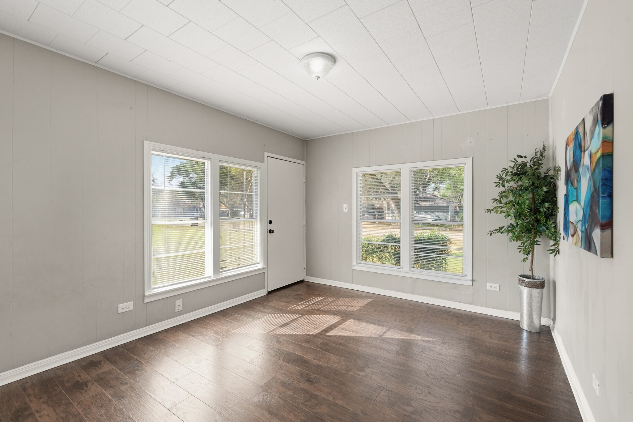 1509 Mulcahy Street Rosenberg, TX 77471 - Photo 21 of 41 a view of an empty room with a window and wooden floor