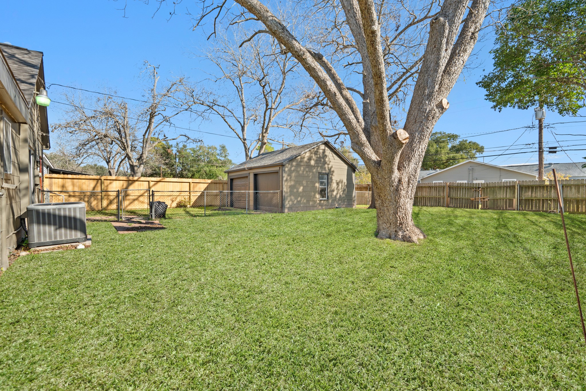 1509 Mulcahy Street Rosenberg, TX 77471 - Photo 22 of 41 a front view of a house with a yard