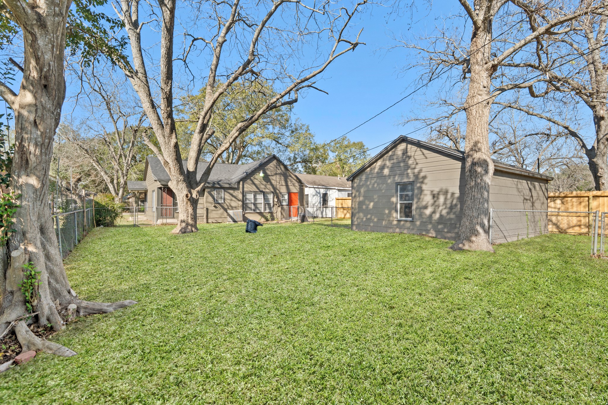 1509 Mulcahy Street Rosenberg, TX 77471 - Photo 23 of 41 a view of a yard with brick walls