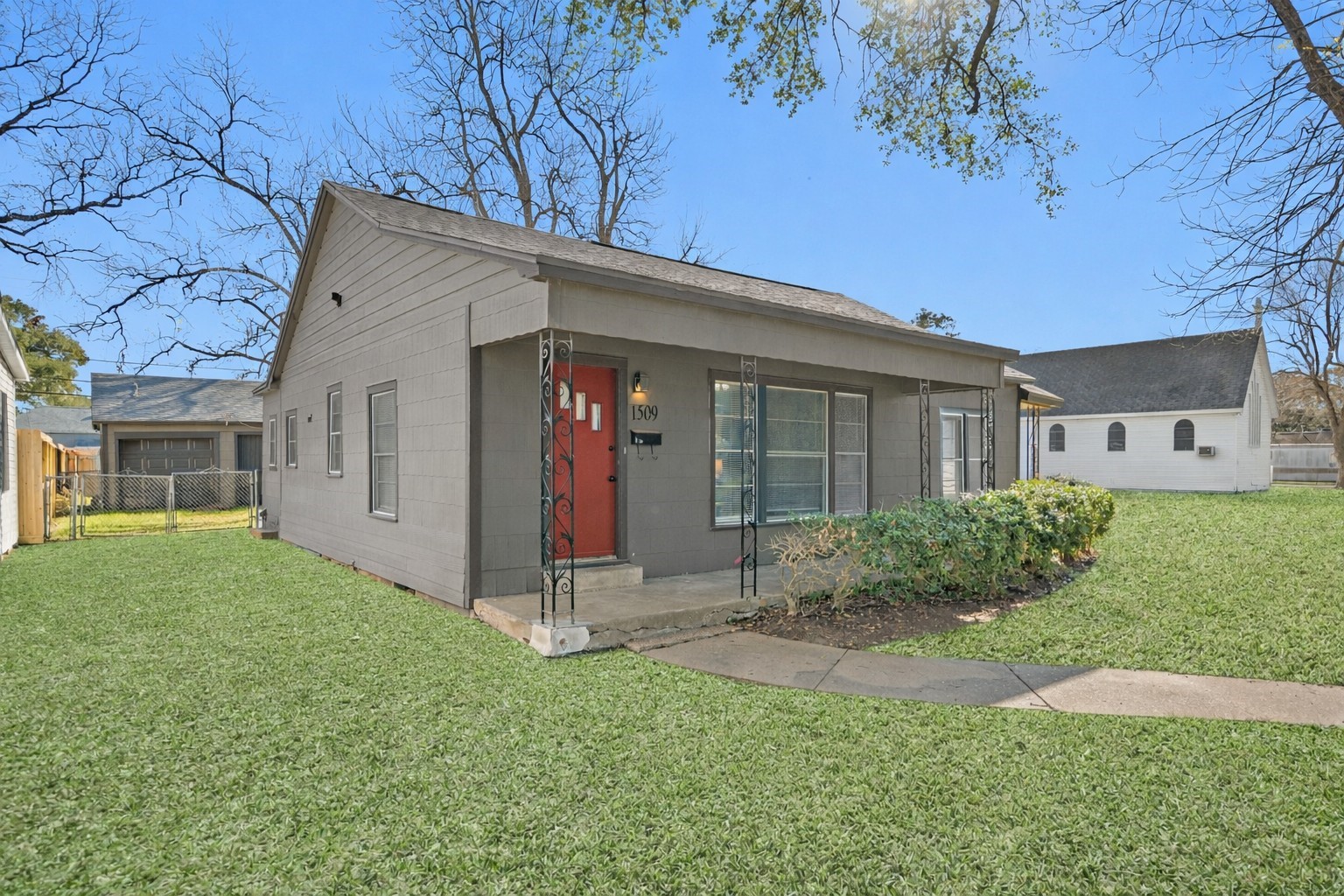 1509 Mulcahy Street Rosenberg, TX 77471 - Photo 2 of 41 a view of a house with a yard
