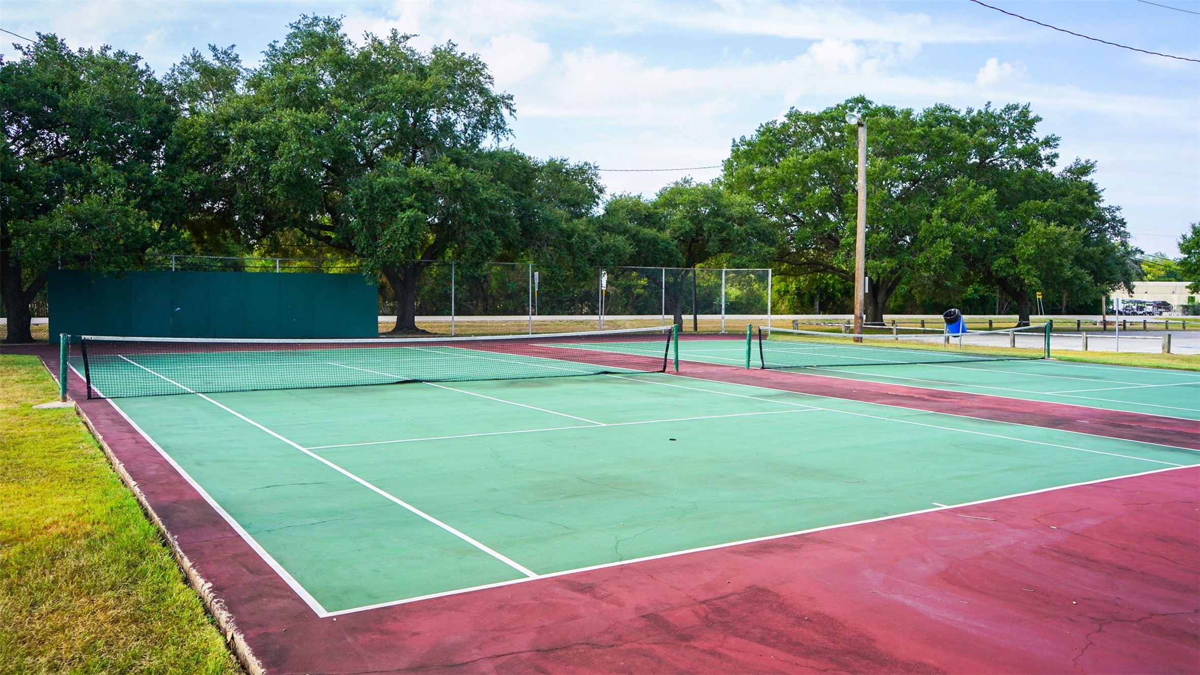 1509 Mulcahy Street Rosenberg, TX 77471 - Photo 34 of 41 a view of an outdoor space and tennis court