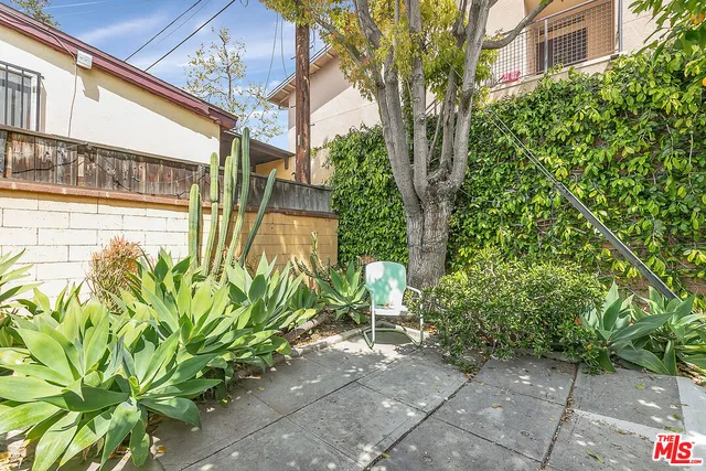 a view of a back yard of the house