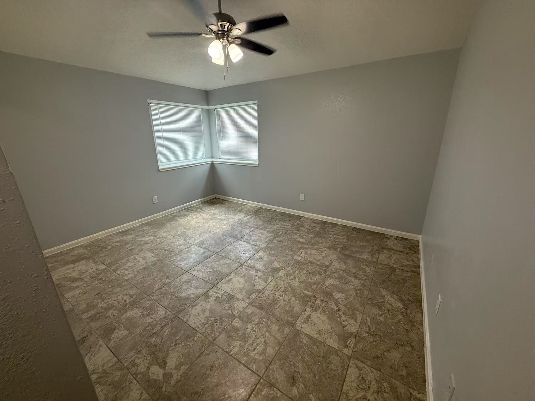 5719 Lycomb Drive Houston, TX 77053 - Photo 12 of 24 a view of an empty room with a window