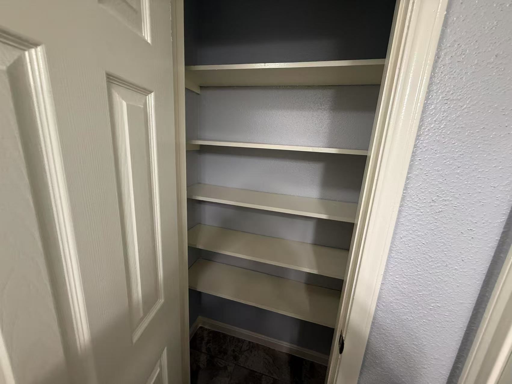 5719 Lycomb Drive Houston, TX 77053 - Photo 15 of 24 a view of walk in closet with empty racks