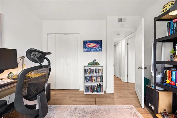 a view of a livingroom with furniture and toys
